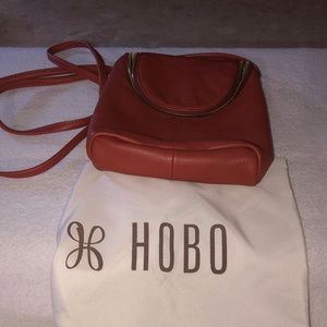 Ladies leather designer crossbody handbag by Hobo.